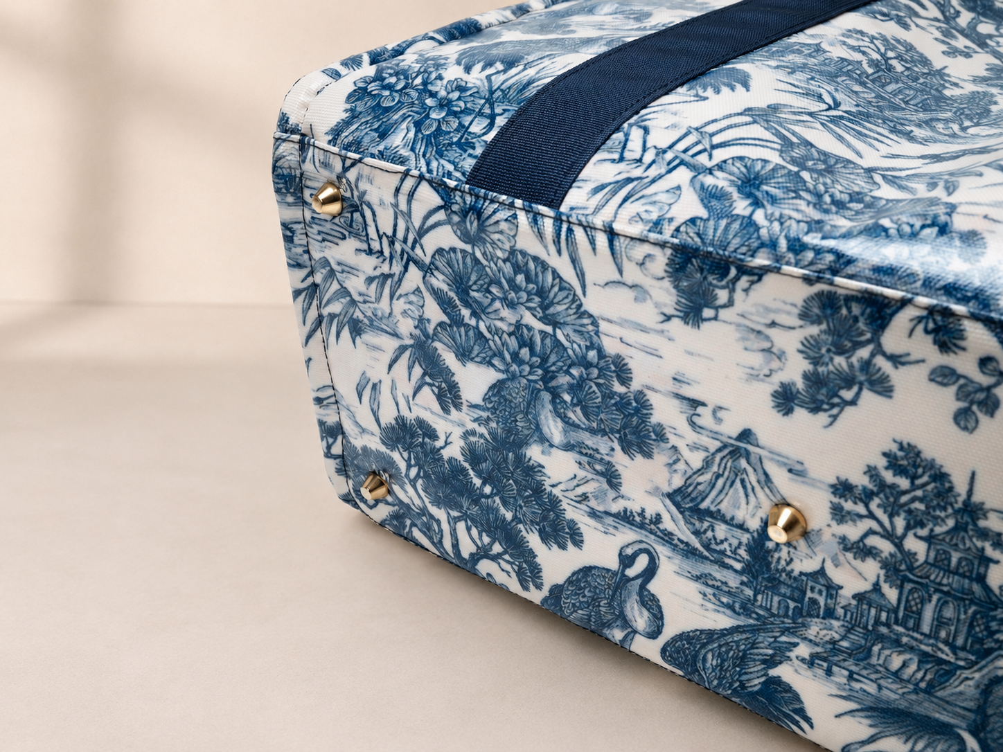 Mia Mor tote bag close-up — premium coated fabric and gold-tone hardware detail