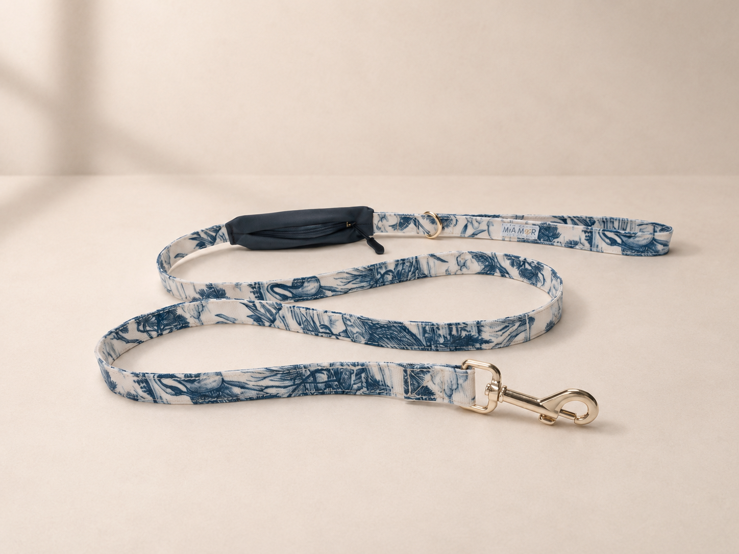 Mia Mor dog collar close-up — adjustable premium coated collar with elegant gold hardware